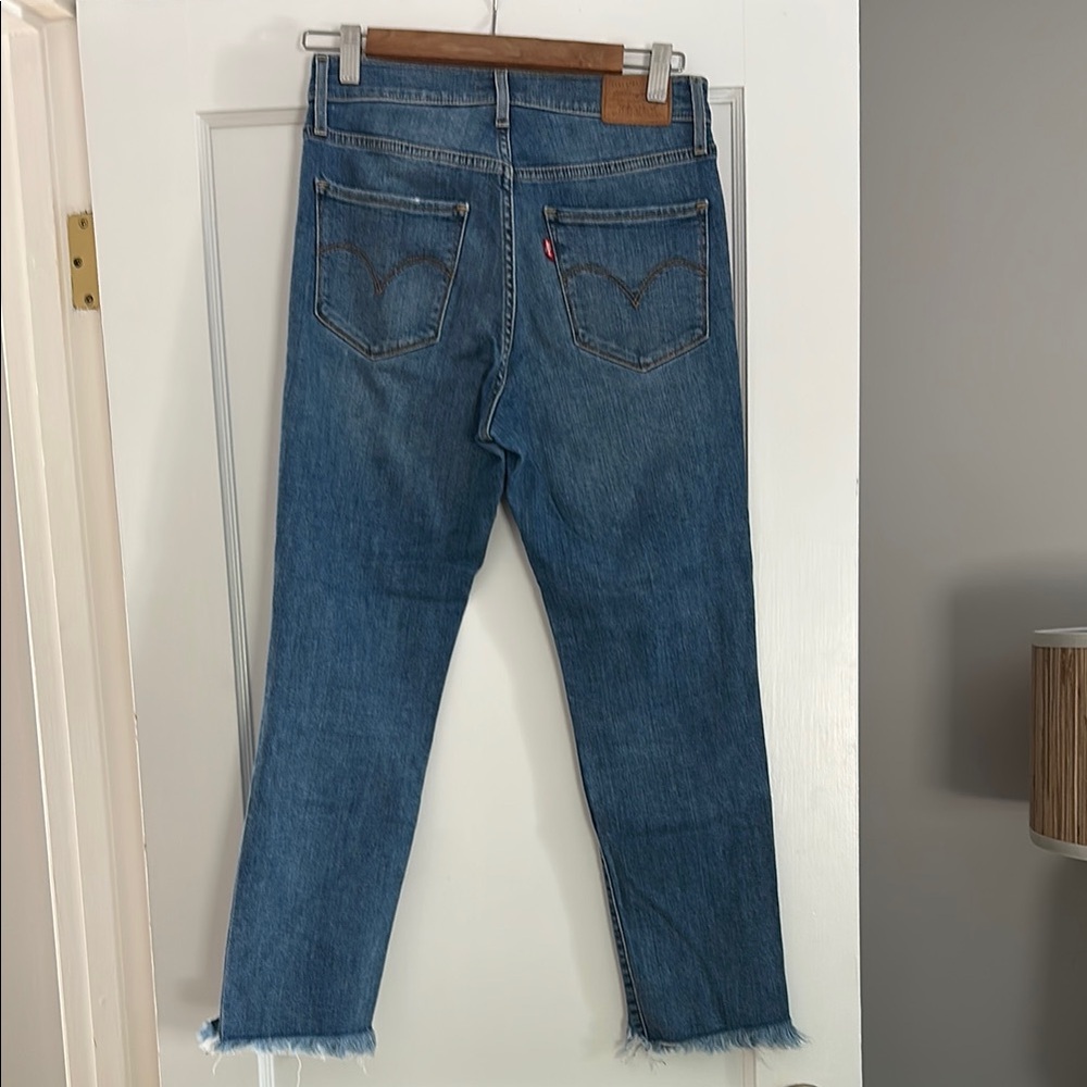 Levi’s Jeans (724 High Rise Straight) with Frayed Hem and distressed front